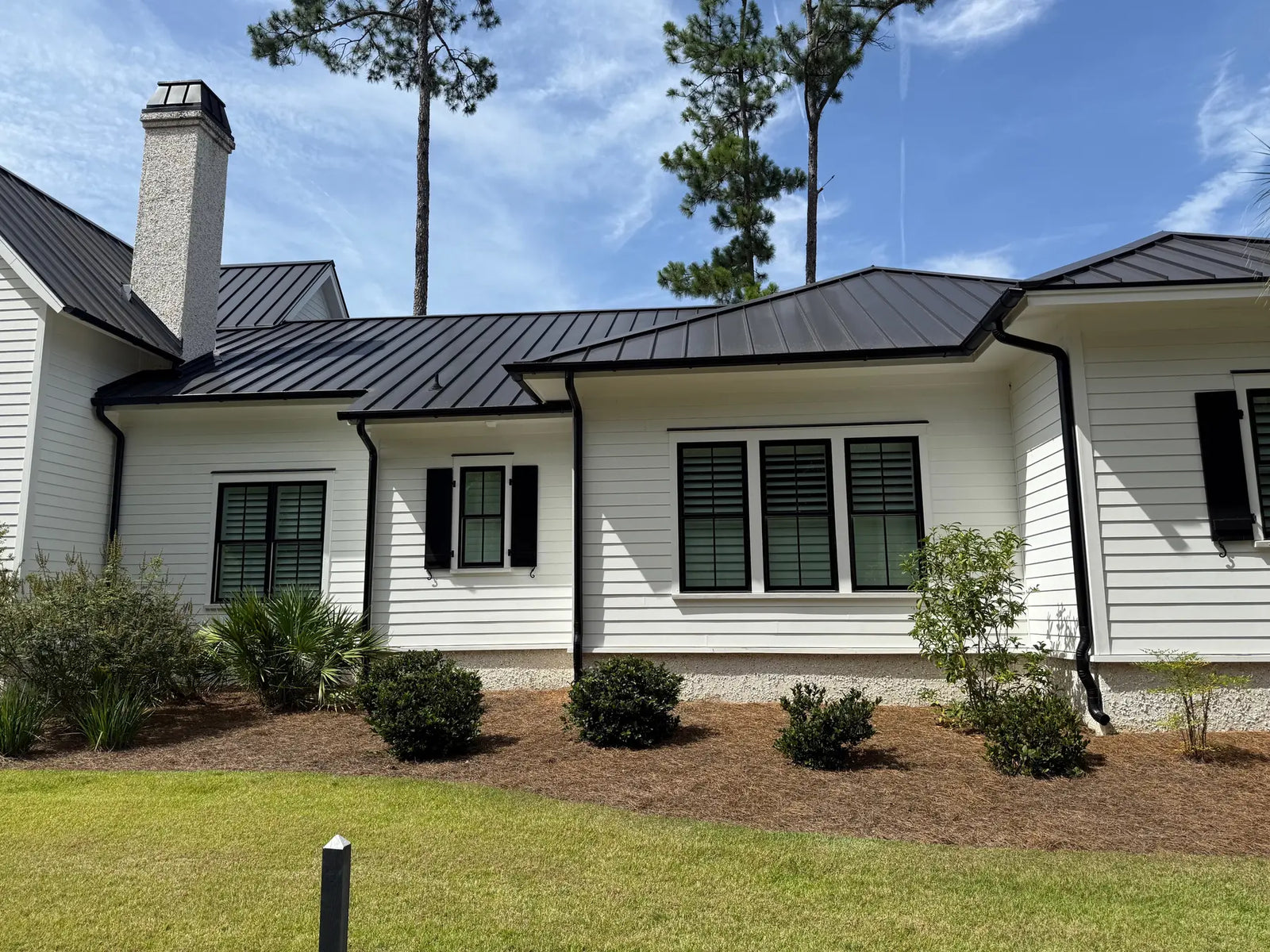 Seamless gutters and downspouts on a home featured by ValueFilter